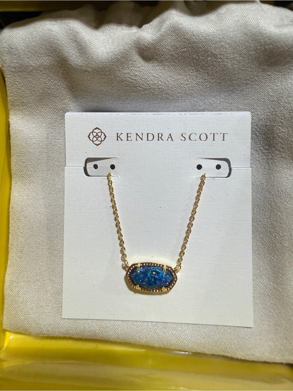 Kendra Scott Gold Necklace with Iridescent Blue Stone